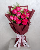 12 Fuchsia Pink Roses Bouquet - Uniflora